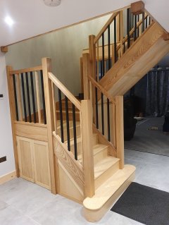 Solid Ash Staircase Bullnose under stair cupboard Ash Spindle