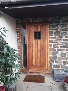 Curved head Iroko door