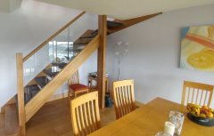 Oak open tread staircase glass inset balustrade