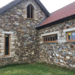 arched traditional oak wooden flush casement window