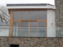 wooden oak fully glazed screen 2 lift & slide doors